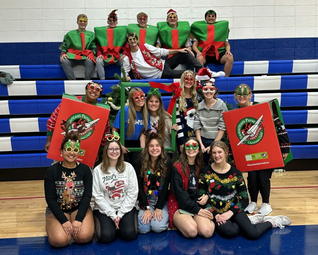 Ben Dombroski with QHS Leadership Class - Operation Christmas Child Packing Party 2023