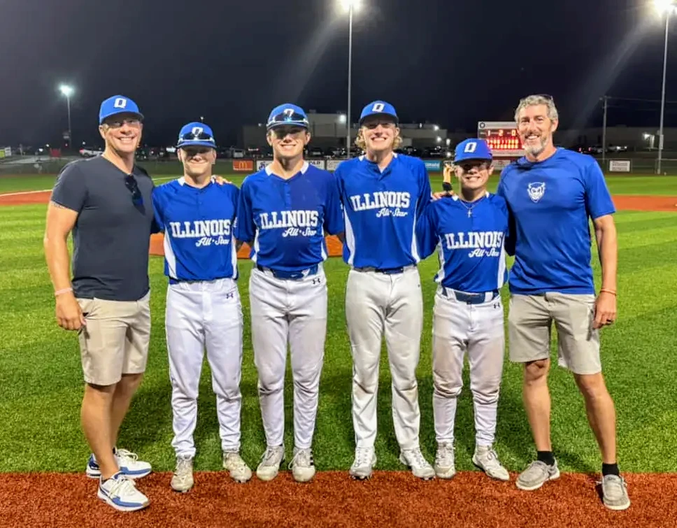 Ryan with Coach Lawson and the 2024 QHS Blue Devil Seniors and Illinois All-Stars