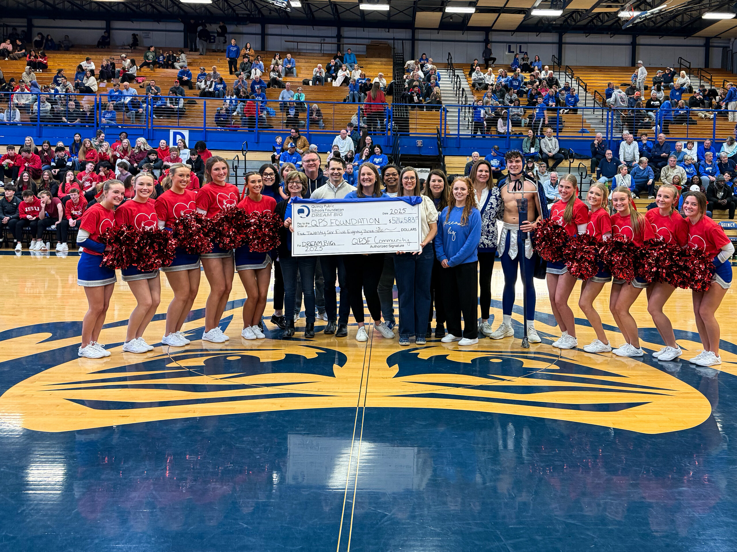 Campaign Chairs Eric Loos & Heidi Holzgrafe, with QPSF staff & trustees, and QHS students as the 2025 Dream Big Annual Campaign results were announced on January 31, 2026.